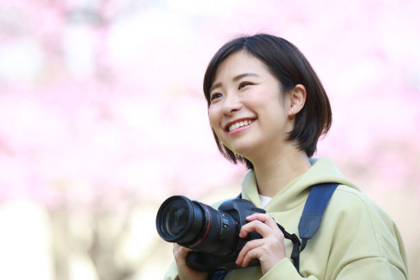 istock Woman taking a picture 1361458876