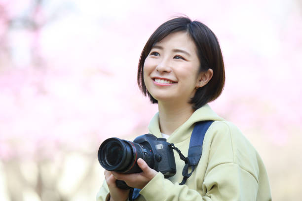 istock Woman taking a picture 1361458906