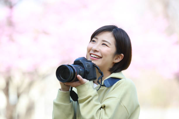 istock Woman taking a picture 1361458932
