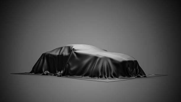 istock presentation car under black cloth on gray background. 3d rendering 1361459793