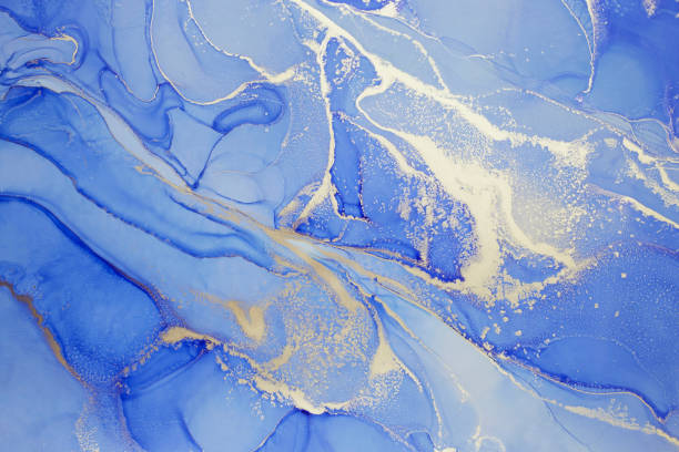 istock Expressively flowing abstract hand painted alcohol ink texture 1361459878