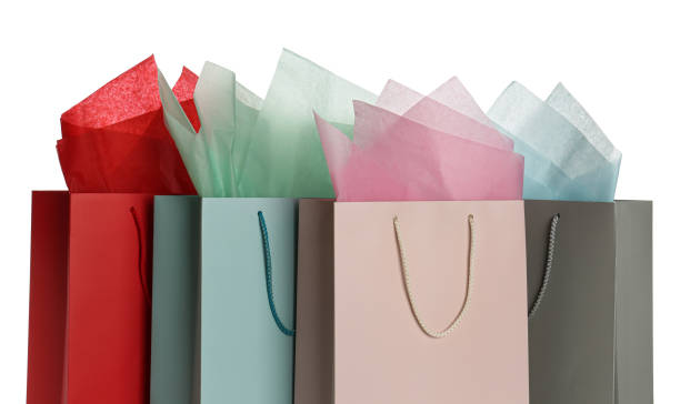 istock Gift bags with paper on white background 1361459951