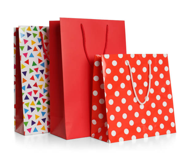 istock Stylish gift paper bags isolated on white 1361460859