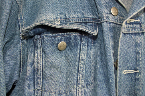 close up of a blue jeans jacket
