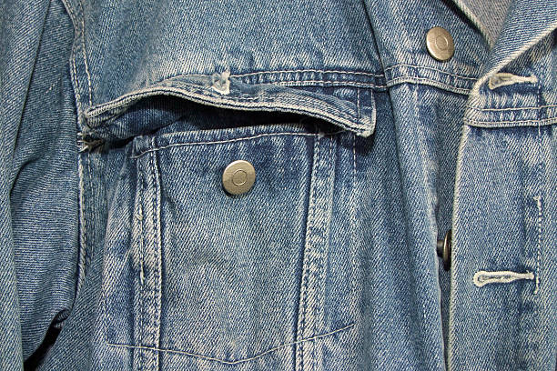 Jeans Jacket close up of a blue jeans jacket denim jacket stock pictures, royalty-free photos & images