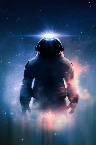 Epic view of an astronaut or cosmonaut in spacesuit in space with stars, nebula and galaxy around him. Book cover or a poster design. Sci-fi and fantasy theme.