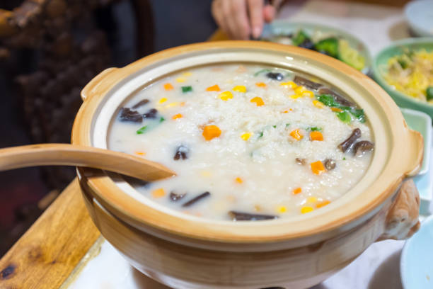 One pot vegetable porridge, ceramic pot, ready to eat
