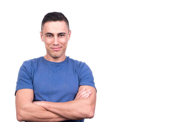 istock Smiling man standing with arms crossed and relaxed expression 1361467194