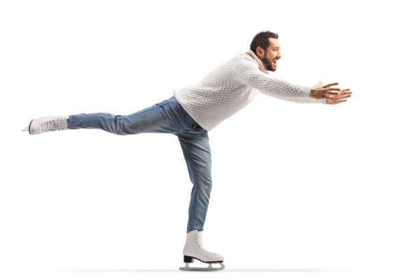 istock Man in jeans and white knitwear practicing ice skating 1361468356