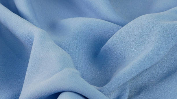 istock baby blue fabric texture, wrinkled fabric as a background 1361470593