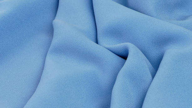 istock baby blue fabric texture, wrinkled fabric as a background 1361470642