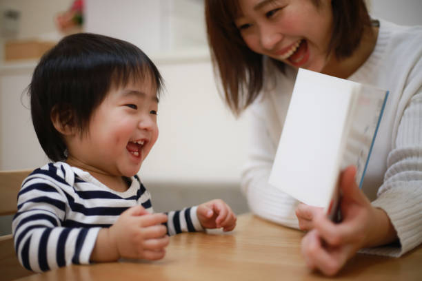 istock Parents and children reading 1361474075