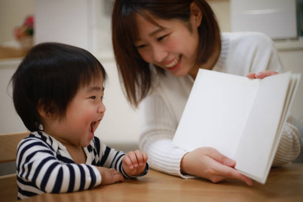 istock Parents and children reading 1361474085