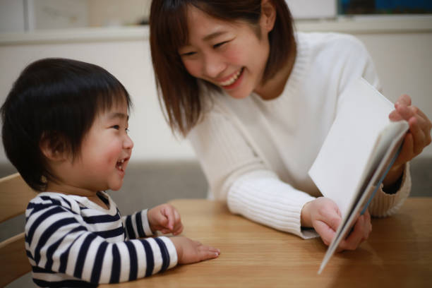 istock Parents and children reading 1361474091
