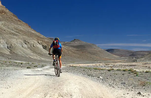 Female biker in the High Atlas mountain-range in Morocco