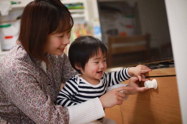 istock Parents and children taking safety measures 1361474274