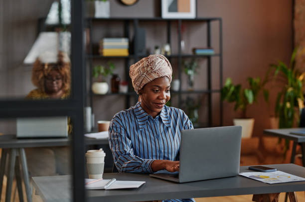 istock Businesswoman working at office 1361476115