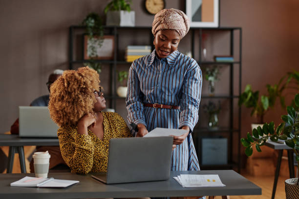 istock Business colleagues working at office 1361476912