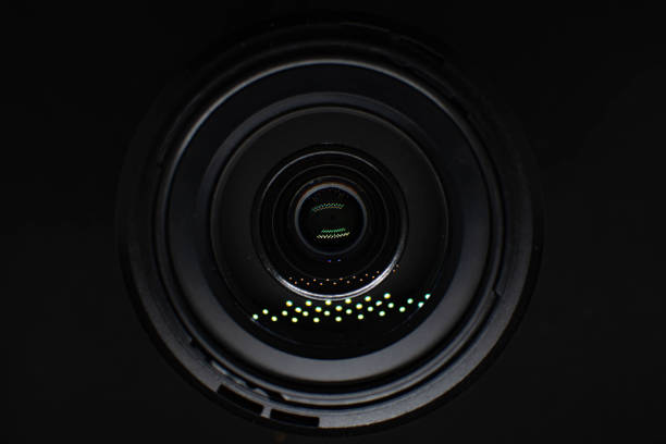 istock Camera lens on a black background. Close-up camera lens 1361477345