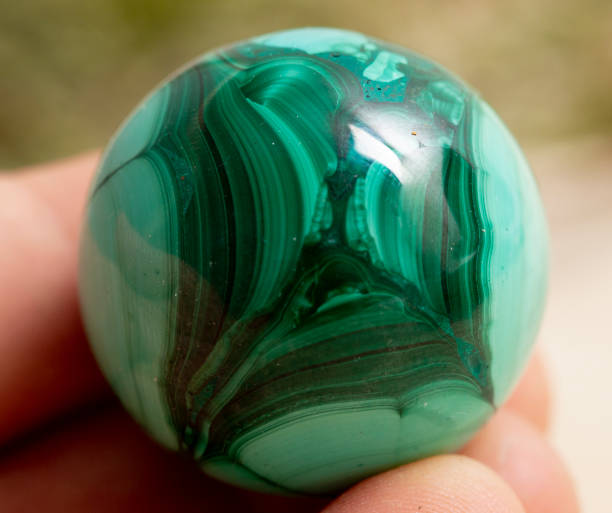 istock malachite  mineral specimen stone rock geology gem crystal 1361478393