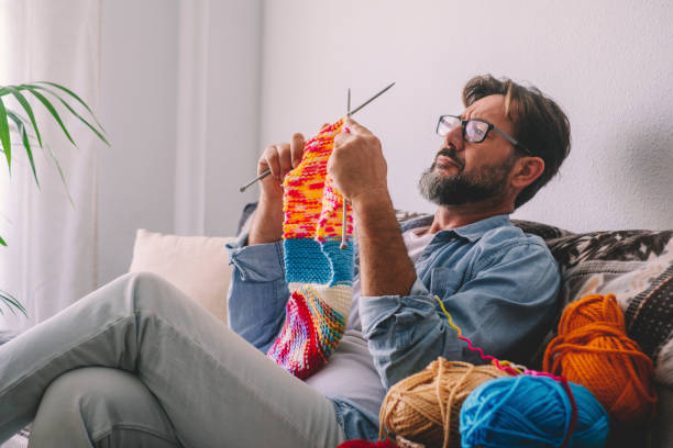 istock Man Sitting On Sofa At Home 1361480703