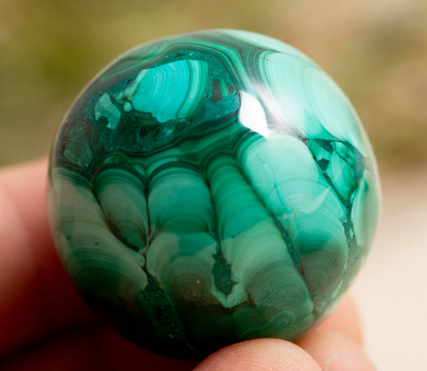 istock malachite  mineral specimen stone rock geology gem crystal 1361480853