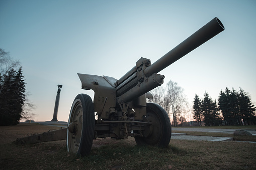 Soviet howitzer. Russian long-range artillery gun in position.