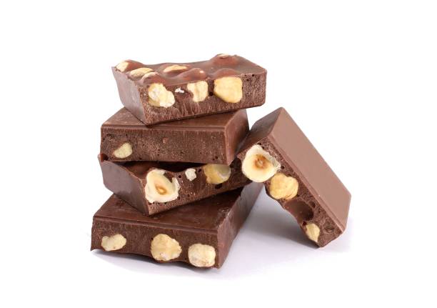 istock Stack of pieces of chocolate bar with hazelnuts 1361489072