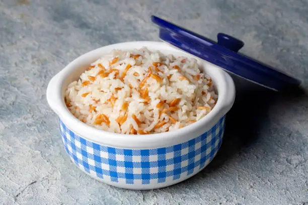 Traditional delicious Turkish food; Turkish style rice pilaf (Turkish name; Arpa sehriyeli pirinc pilavi)