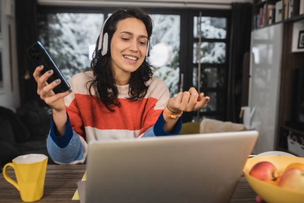 istock Girl working from home and making an online meeting 1361491928