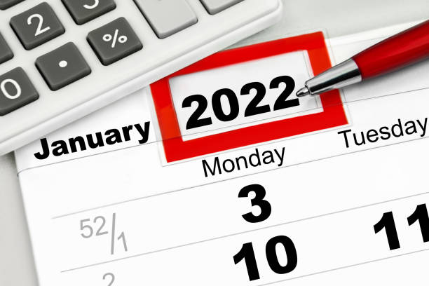 istock Calendar 2022 January 3 and calculator with red pen 1361494634
