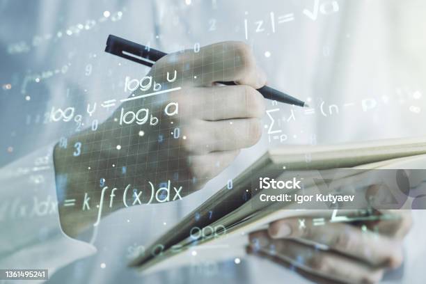 Creative Scientific Formula Concept With Man Hand Writing In Notebook ...