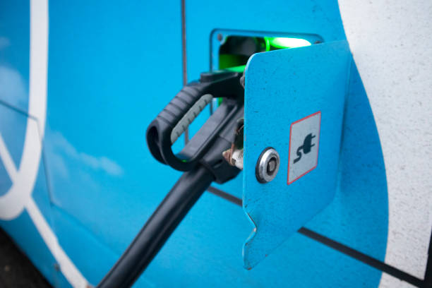 istock Electronic bus charge with electric charging station 1361496536