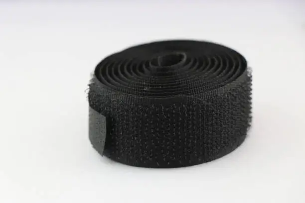 Velcro strip or hook and loop fastener isolated on white