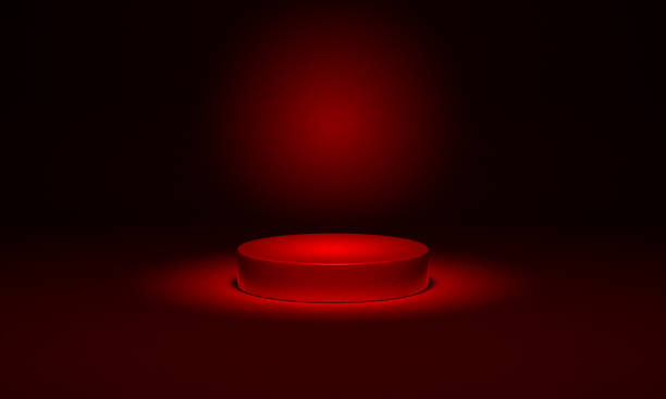 istock Spot light on red podium pedestal with circle shape. Luxury product display mockup. 3d render stage on dark background scene. 1361505987
