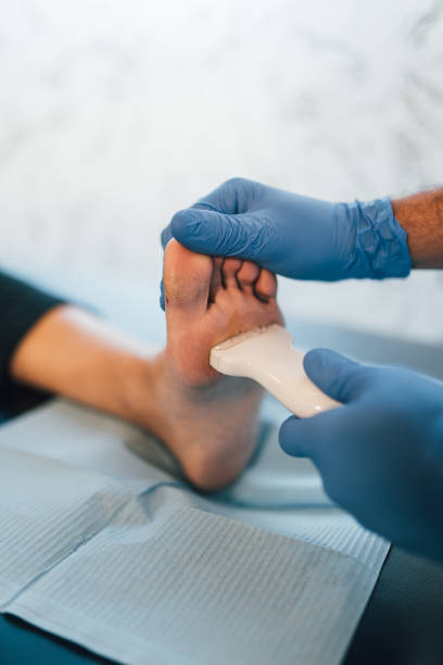 istock Podiatrist doing an ultrasound test to patient's foot. 1361507016