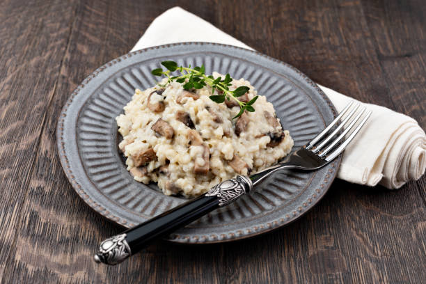 istock Mushroom risotto on plate, close up view 1361509299
