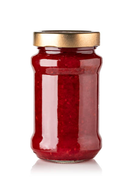 istock Jars of jam isolated on white background 1361510227
