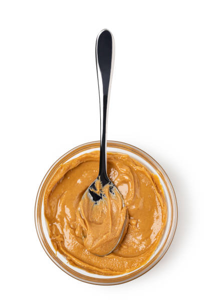 istock Creamy peanut butter in spoon 1361510392