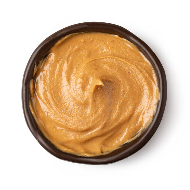 istock Glass bowl of peanut butter 1361510505