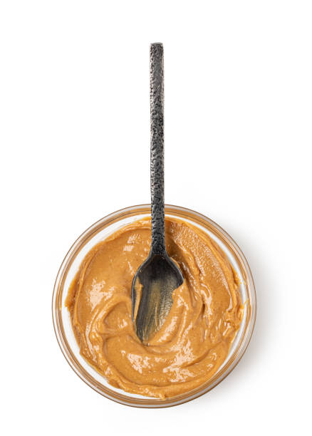 istock Creamy peanut butter in spoon 1361510529