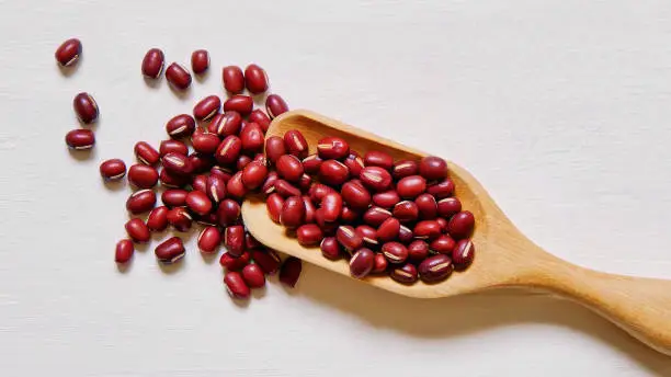 healthy azuki bean or red bean in wood spoon food organic top view texture ,supplementary food, High protein healthy food
