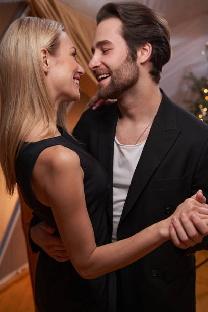 istock Cheerful couple is dancing on romantic date 1361514079