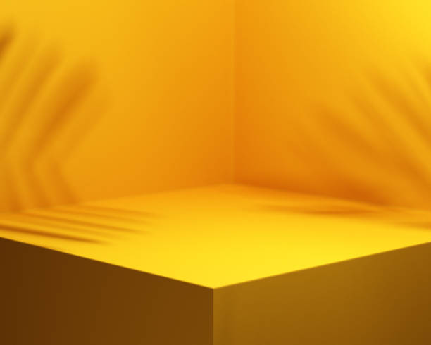 istock Yellow background studio interior room with tropical palm shadow. Minimalist summer product stage platform mock up. 3d render of square empty space with plant shade for product placement. 1361514539