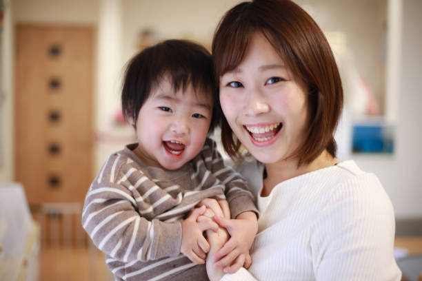 istock Smiley parent and child 1361516139