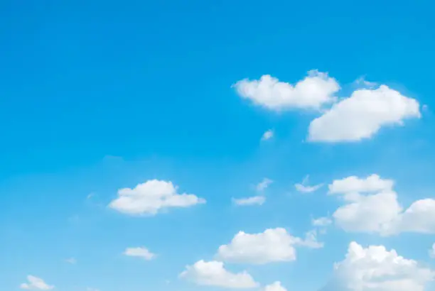 white fluffys clouds sky background with blue sky background for copy space.
