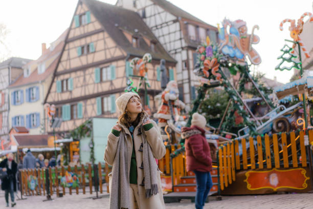 istock Woman walking in Colmar on Christmas 1361518295