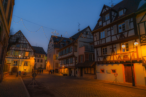 Scenic view of Christmas market and  Alsace region decorated for  Christmas at night