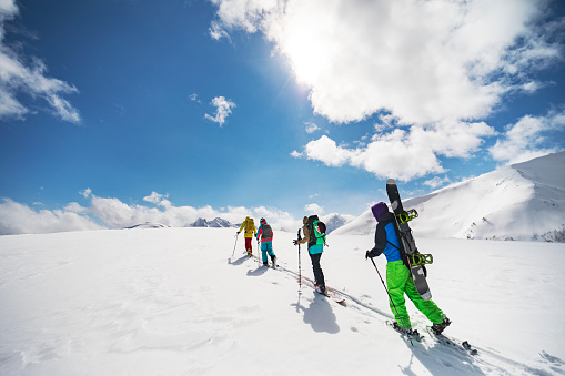 People going back country skiing
