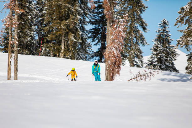 istock Mother and son skiing 1361533916